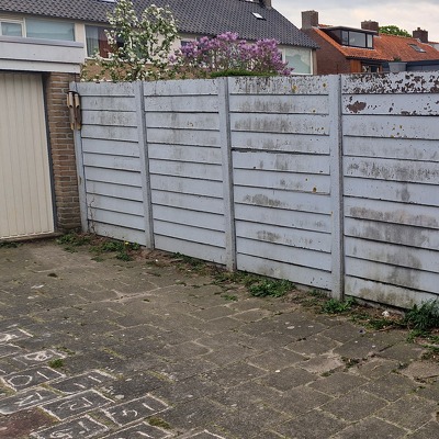 11m betonschutting verwijderen