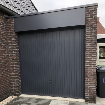 Garagedeur vervangen door houten deuren met kozijn