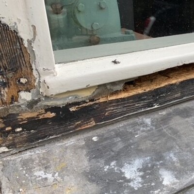 vervangen rotte onderkant raamkozijn / reparatie onderkant garage deur